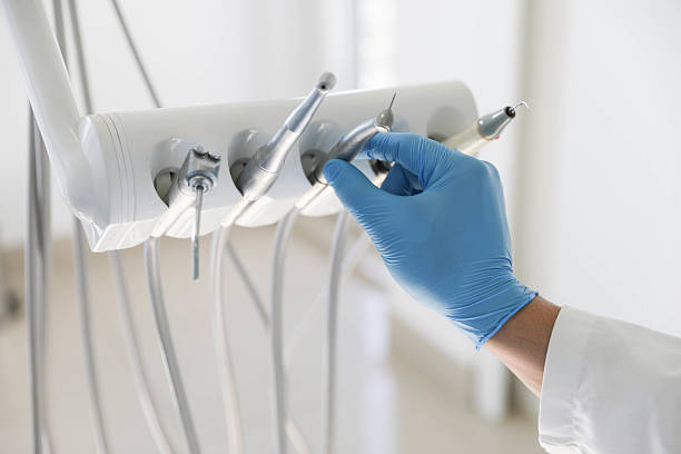 Professional Tooth Extraction technician working in Mooreville, MS